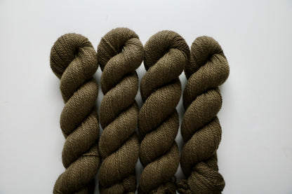 Dark yellow green DK weight yarn