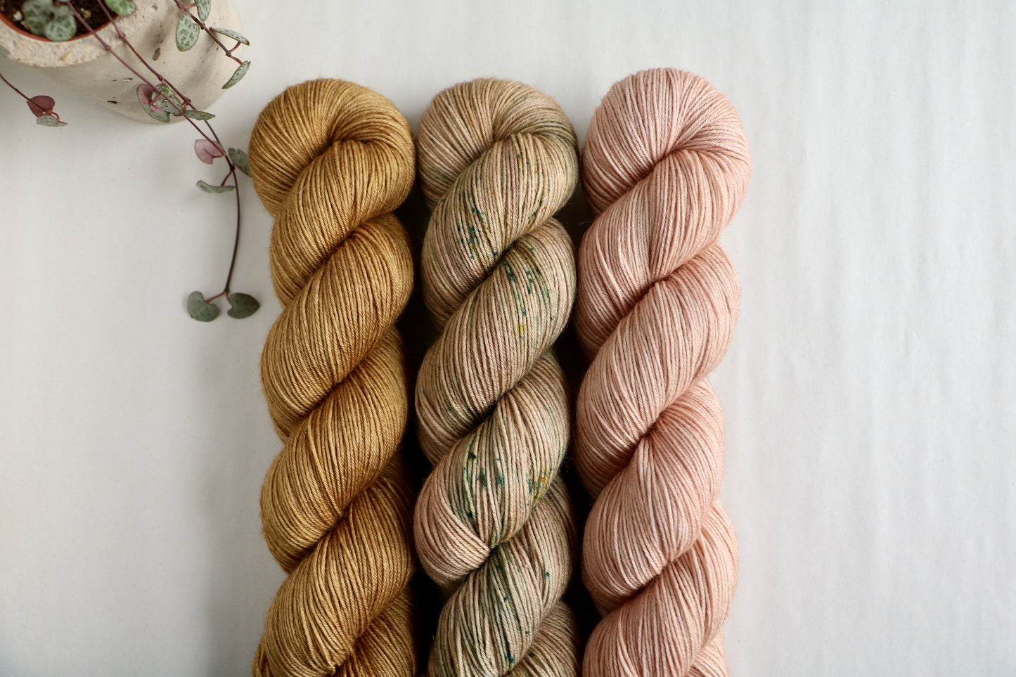 Three colours from summer 22 colection hand dyed on BFL yarn. Glow, Fauna and Blossom.