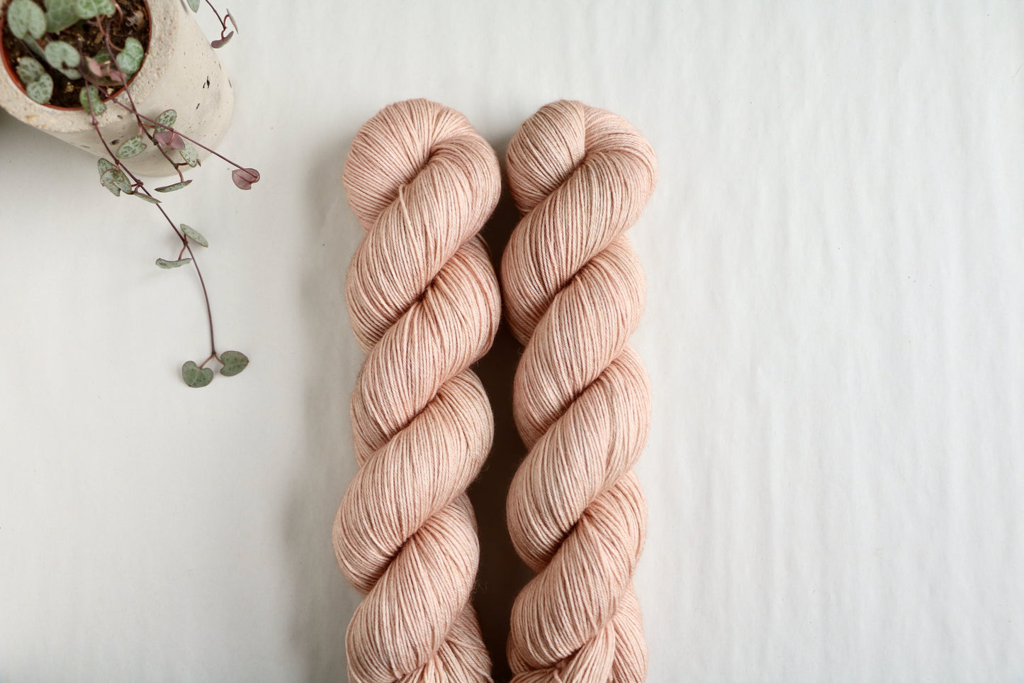 Dirty pink tonal hand-dyed on superwash yarn